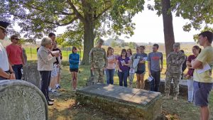 Students visit the Preston family cemetery adjacent to Smithfield Plantation. 